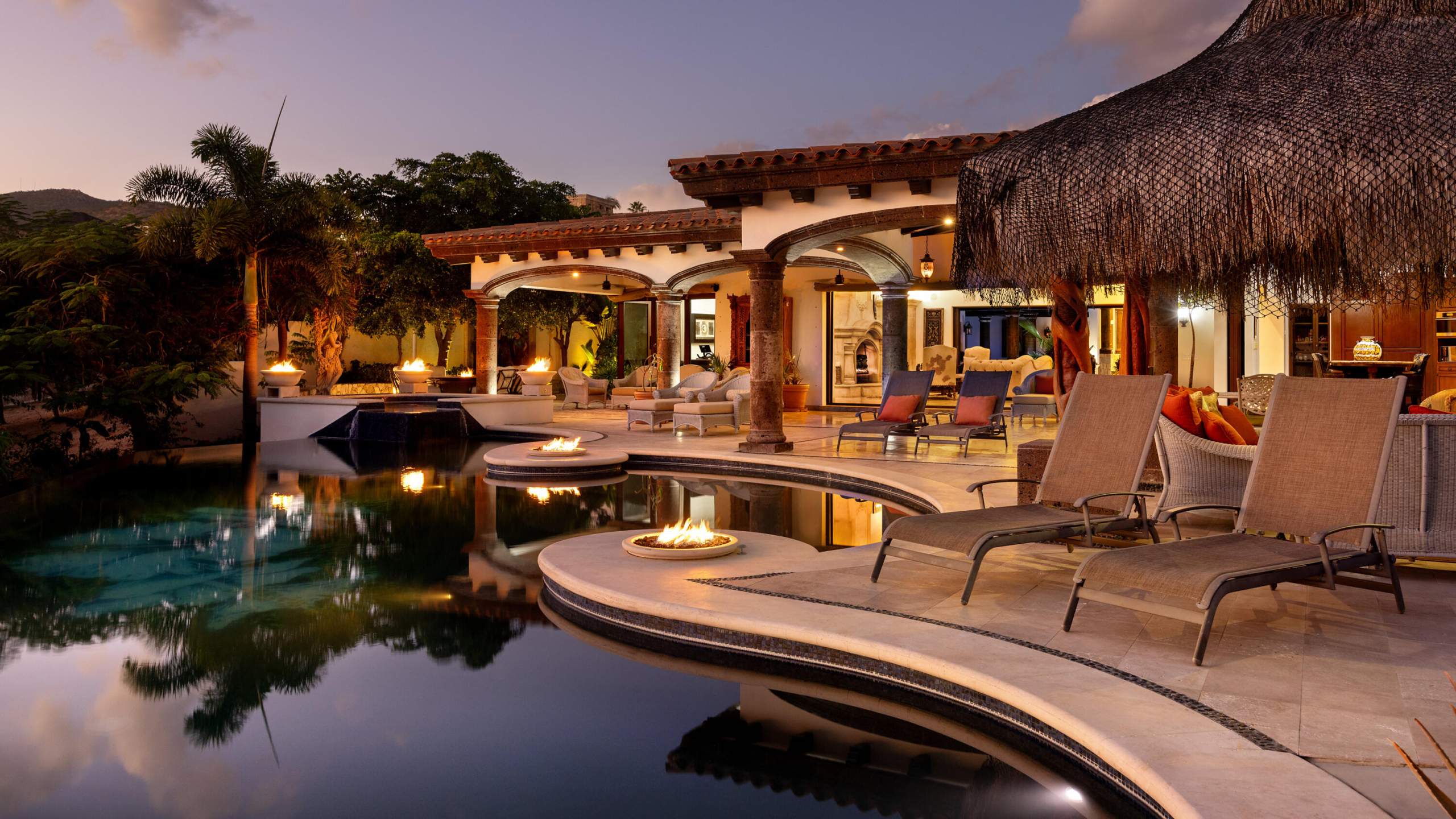 Cabo del Sol Las Posadas Introducing Villa de Paz, an exceptional single-level estate nestled within the iconic, guard-gated community of Cabo del Sol, a prestigious master-planned enclave now entering its most exclusive era. Framed by dramatic golf-course vistas and the soft shimmer of the Sea of Cortez, this residence blends timeless hacienda architecture with sophisticated design and an effortless indoor-outdoor flow that defines the finest homes in Los Cabos.From the moment you step inside, the home reveals a warm yet elegant ambiance. Grand, naturally lit living spaces with high ceilings and artisan finishes open seamlessly through expansive sliding glass doors, inviting the outdoors in and creating a lifestyle of breezy, sun-filled ease. The open-concept living, dining, and gourmet kitchen serve as the heart of the homeperfect for quiet mornings, family gatherings, and elevated entertaining alike.The villa offers multiple spacious en-suite bedrooms, thoughtfully positioned for privacy and comfort, along with a versatile TV/guest suite ideal for extended family or visiting friends. Every room feels intentional, serene, and connected to the home's calming energy.Outdoors, Villa de Paz becomes a private resort. The expansive terrace features a sparkling pool and spa, shaded lounging areas, and multiple fire pits strategically placed to create intimate spaces for sunset – Cabo Del Sol, Cabo Corridor, BS